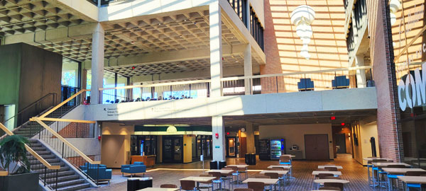 Reverberation control of multi story open spaces